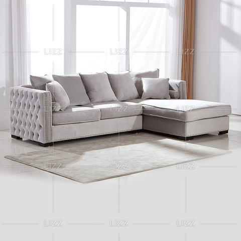 Canapé de loisirs Chesterfield en tissu avec méridienne