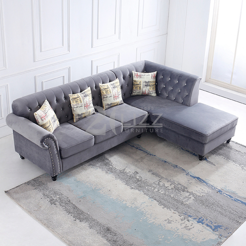 Canapé de salon confortable en forme de L Chesterfield